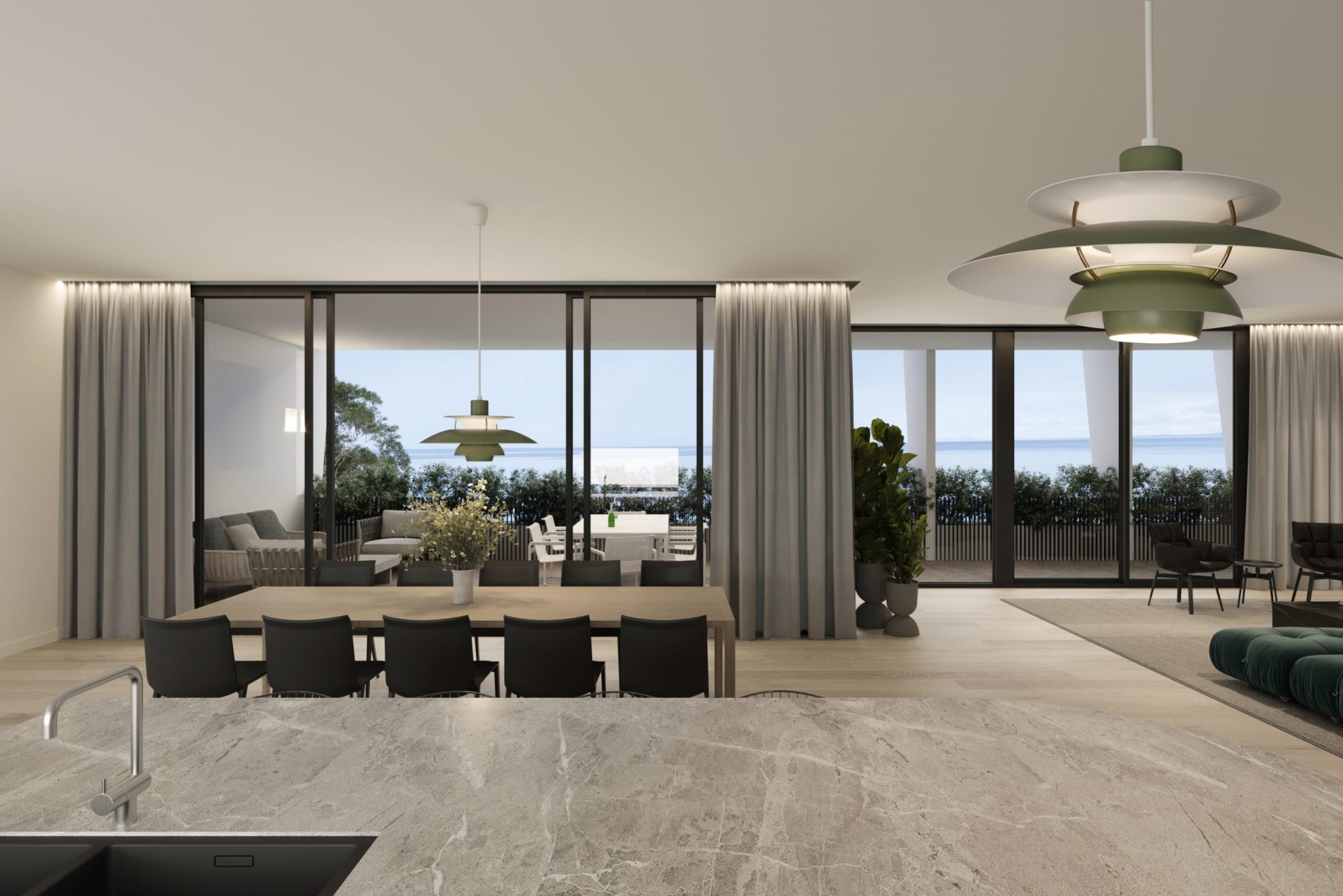 Dining area at 365 Esplanade opening to a terrace with Port Phillip Bay views