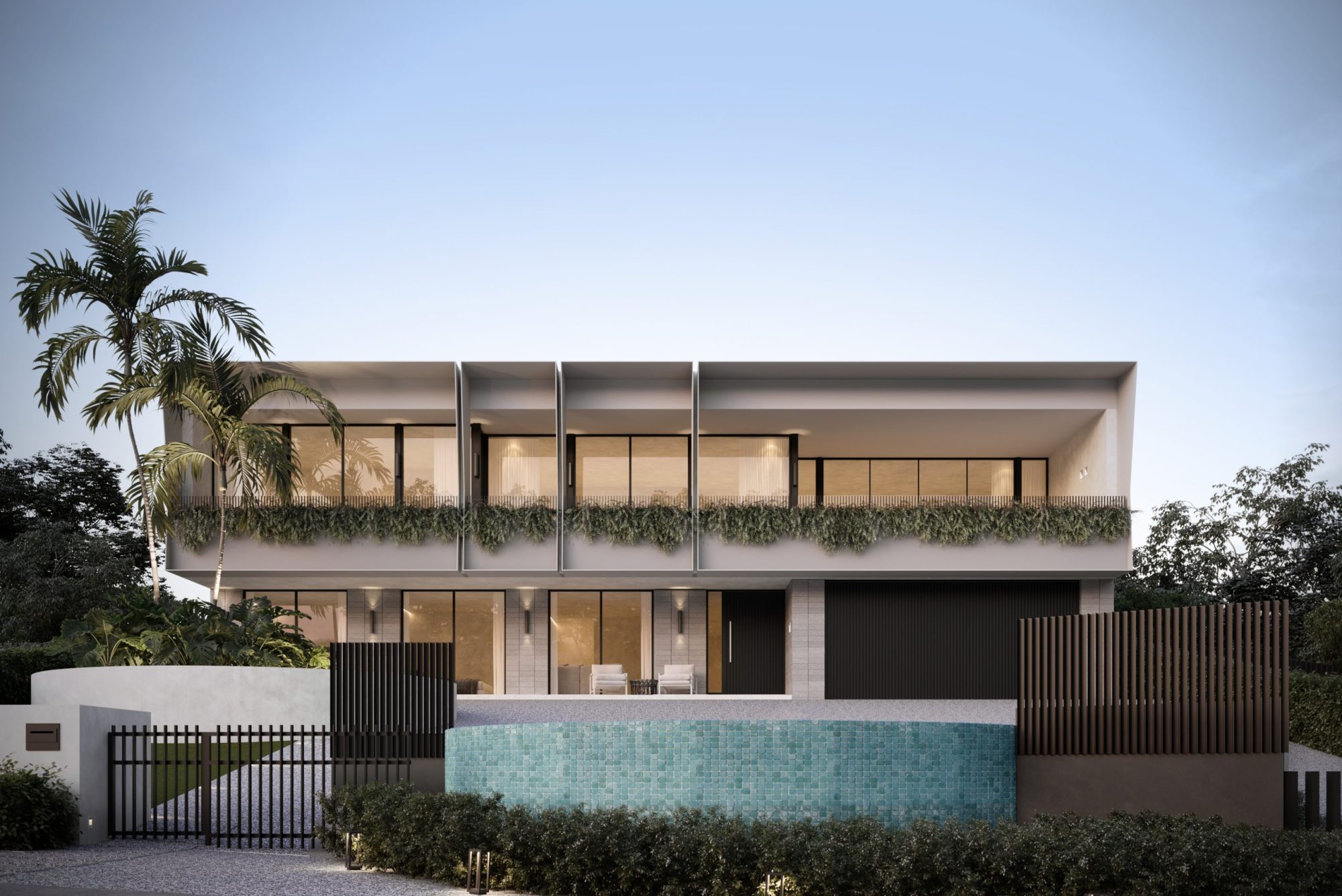 365 Esplanade, Mt Martha at dusk with warm interior lighting behind full-height glazing
