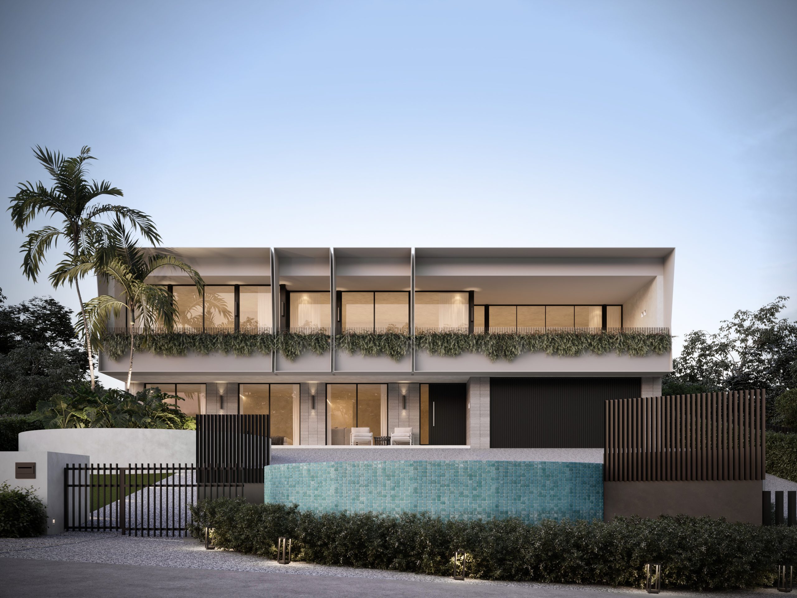 365 Esplanade, Mt Martha at dusk with warm interior lighting behind full-height glazing