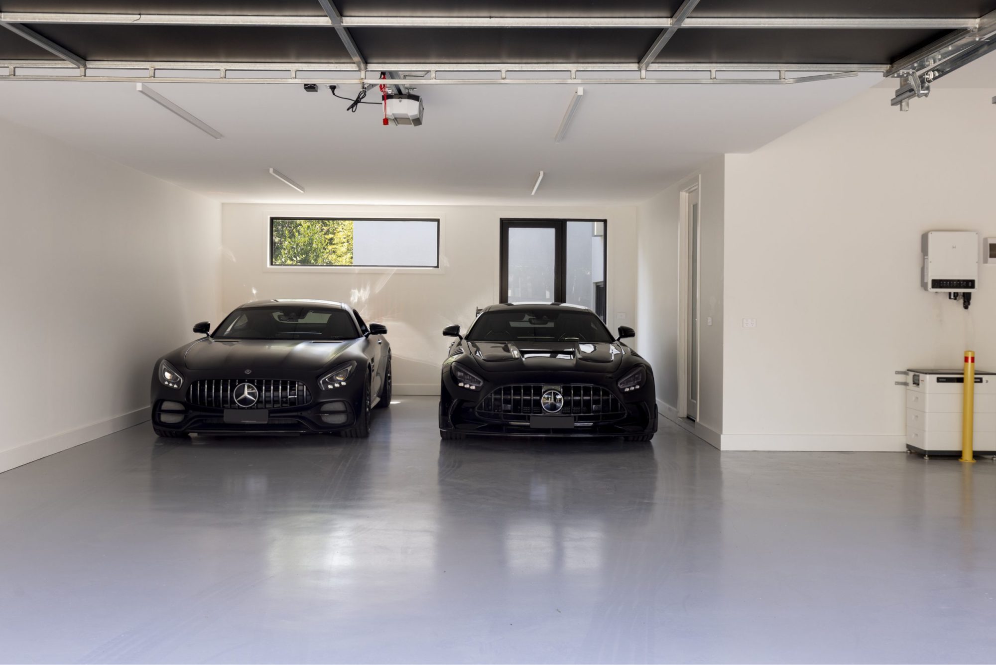 Double garage with polished floor, Scheele Residence Surrey Hills