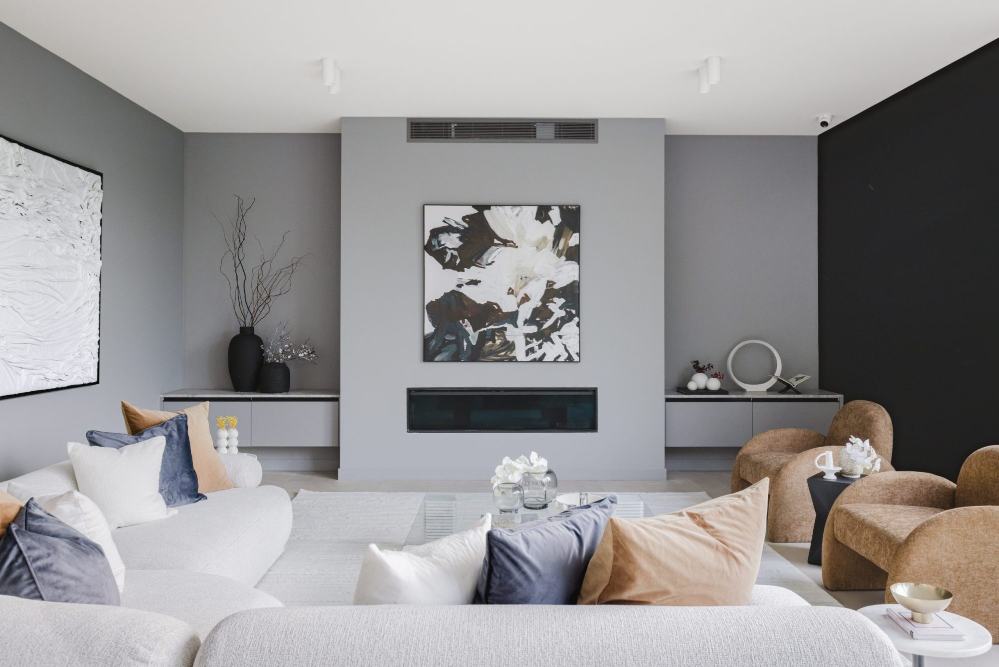 Lounge with fireplace and feature artwork, Scheele Residence Surrey Hills